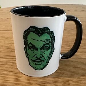 Green Vincent Price Face White and Black Mug